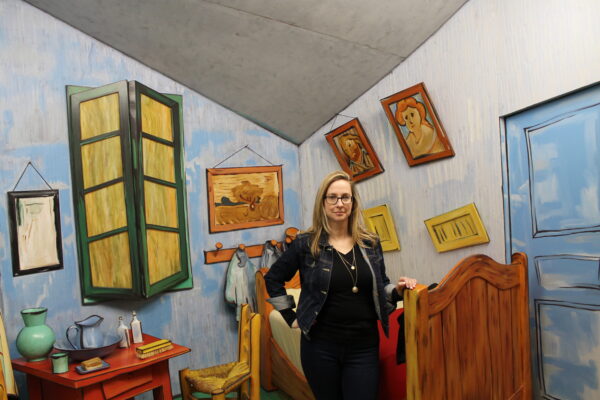 Jackie in a reproduction of van Gogh's Bedroom painting